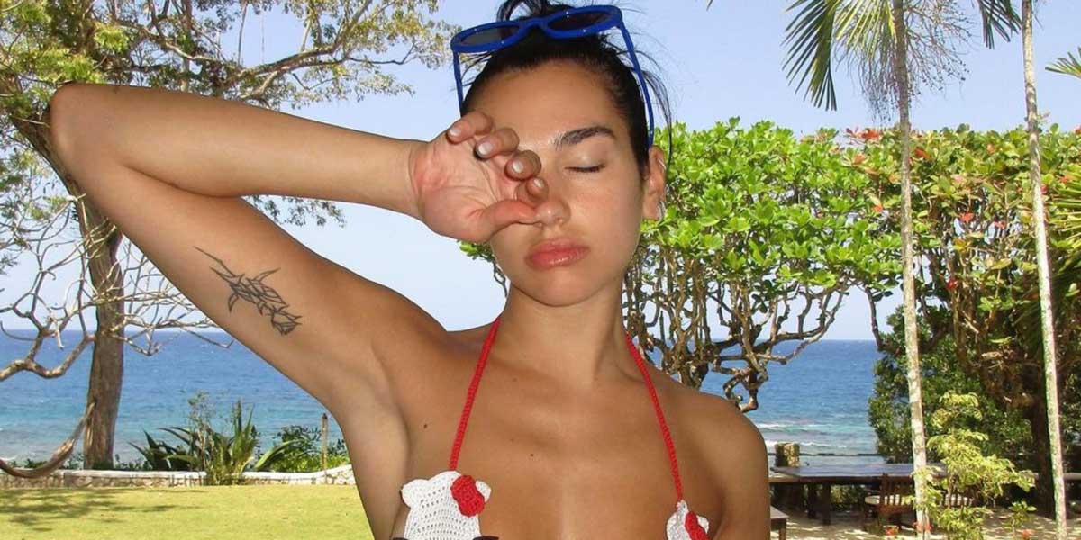 Dua Lipa Relaxes In Jamaice With Tiny Hello Kitty Bikini