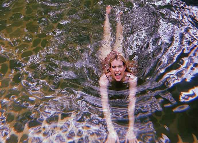 Emma Roberts Vacations In Costa Rica As A ‘Reset’ After Garrett Hedlund Split