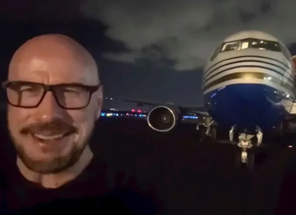 John Travolta Films Himself Flying A Boeing 737 On His 72th Birthday