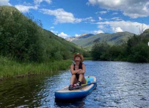 Kyle Richards paddle boards in Colorado (Image: Instagram)