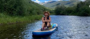 Kyle Richards paddle boards in Colorado (Image: Instagram)