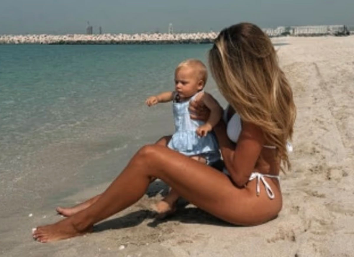‘Love Island’ Star Arabella Chi Hits The Beach In Dubai With Daughter Despite Missile Attacks