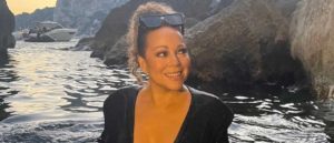 Mariah Carey wears a ball gown underwater water in Capri (Image: Instagram)