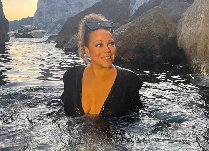 Mariah Carey Gets Wet In Dress On Capri Vacations