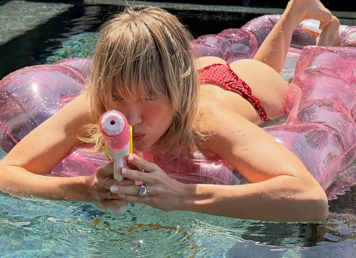 Suki Waterhouse Posts Stunning Snaps Playing In A Pool Amid Marriage Rumors With Robert Pattinson